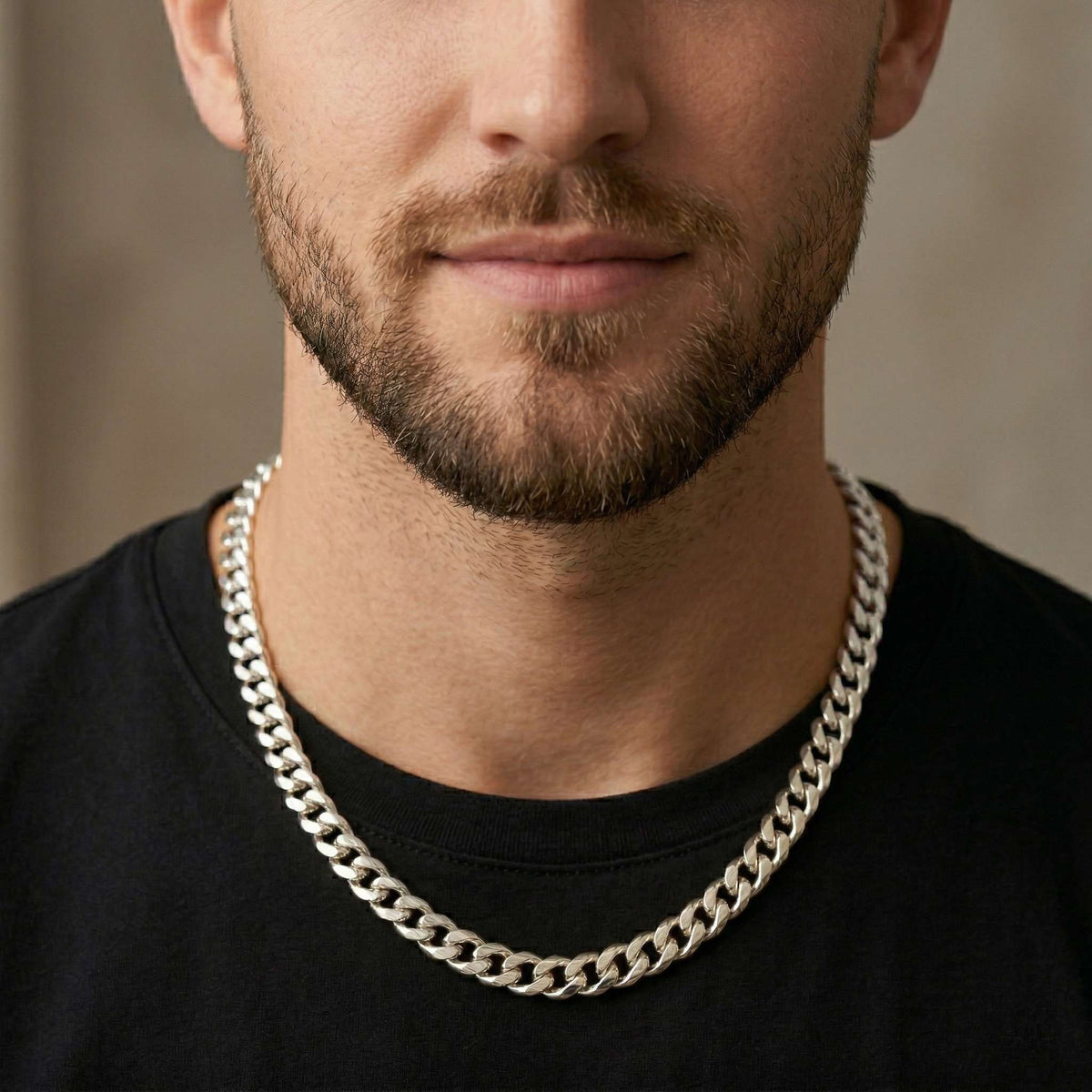 front view of model styling the Matzzo 7mm silver Cuban chain with men's streetwear